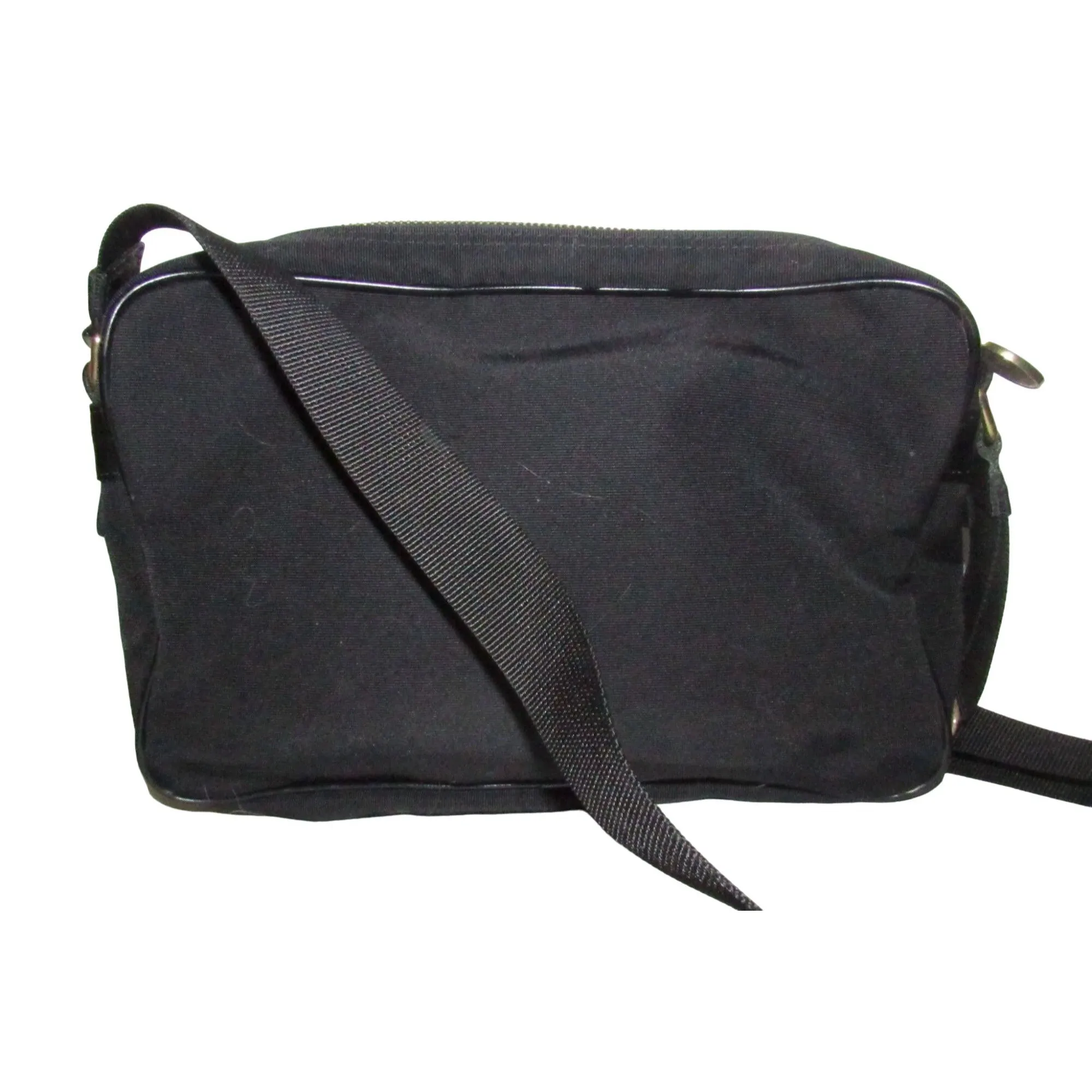 Moschino, black canvas & leather, cross body with a zip top, bold, gold, MOSCHINO letter accents, & a long strap with snaps on both sides